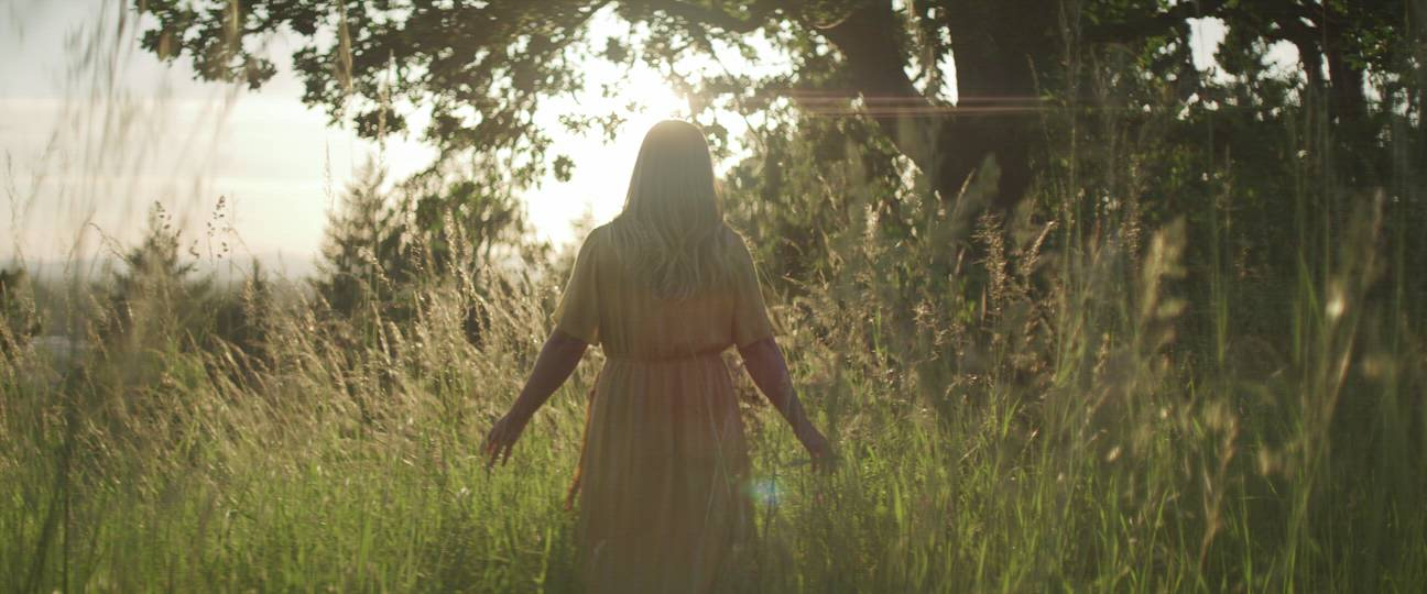 Woman in a Field at Golden Hour | Stock Video Footage | Filmpac.com